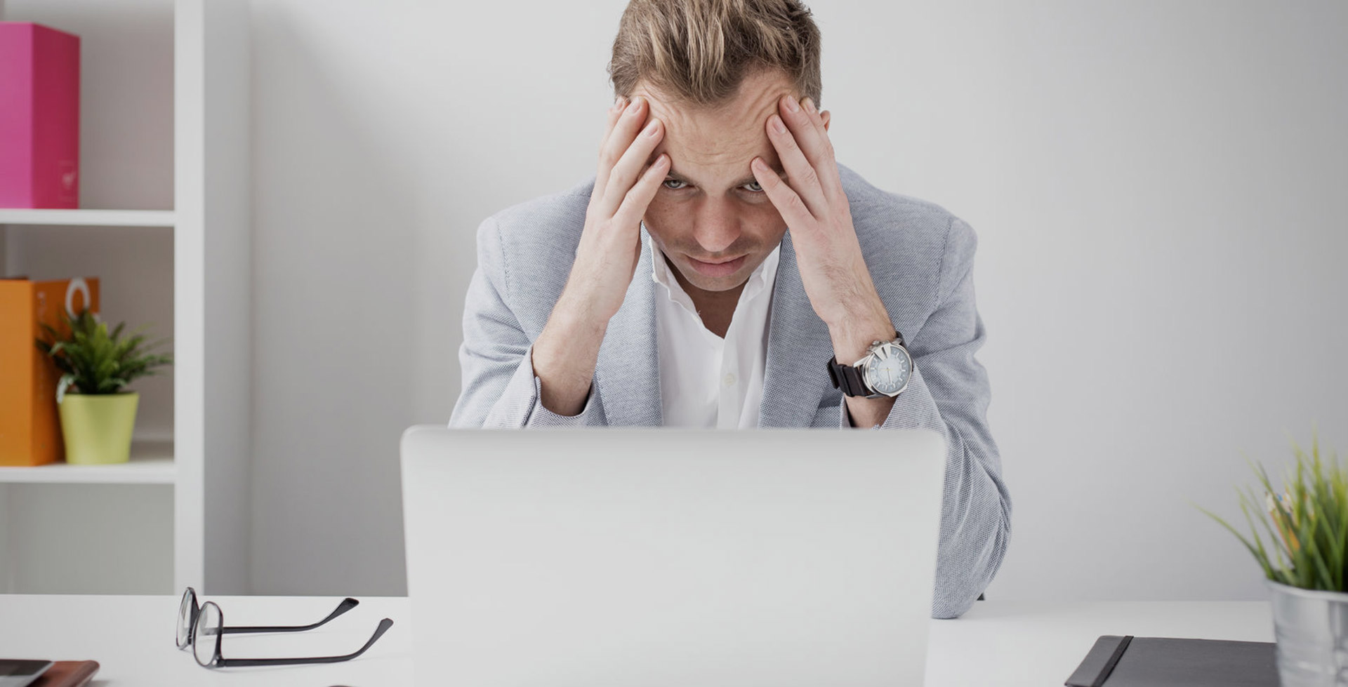 frustrated business man at laptop computer