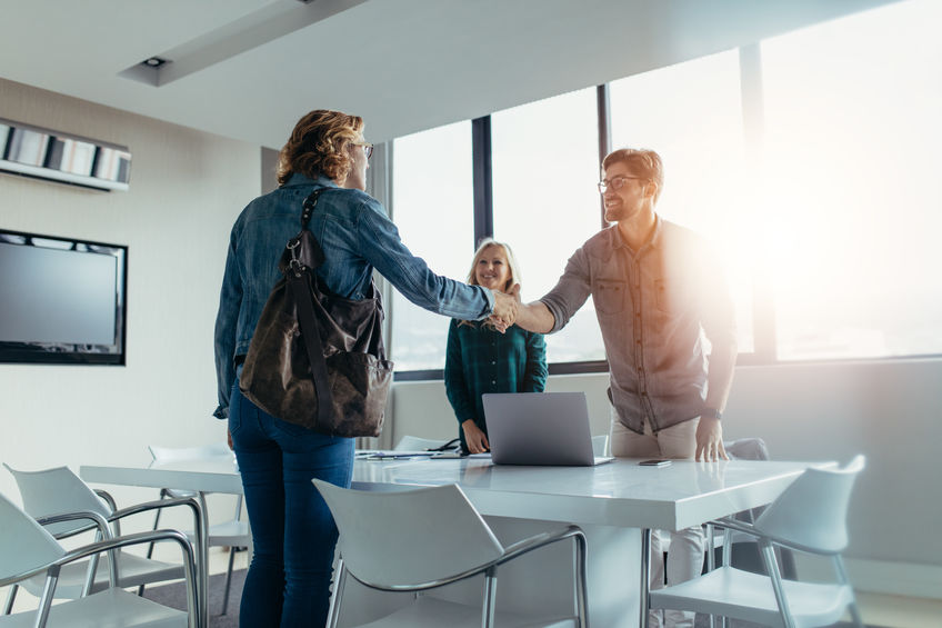 Shaking hands after job offer